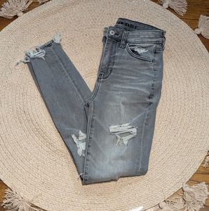 Woman's Grey Distressed Next Level Stretch Jeans by American Eagle Sz 2 Short
